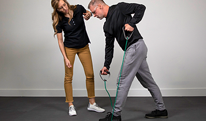 THERABAND resistance band tubing in use